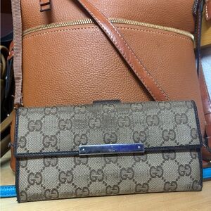 Gucci authentic Beige and Brown Monogram Wallet